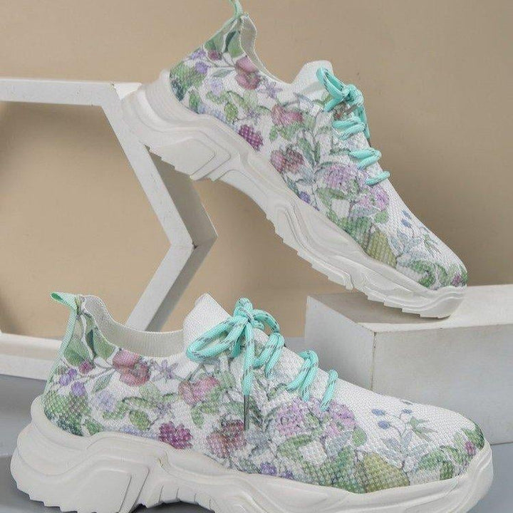 Ademende vetersneakers met bloemenprint
