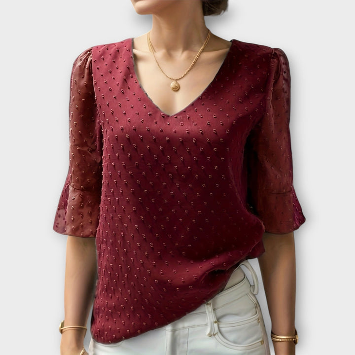 Blouse met diepe halslijn – Soft-Touch statement piece voor elegante avonden of weekendstyling