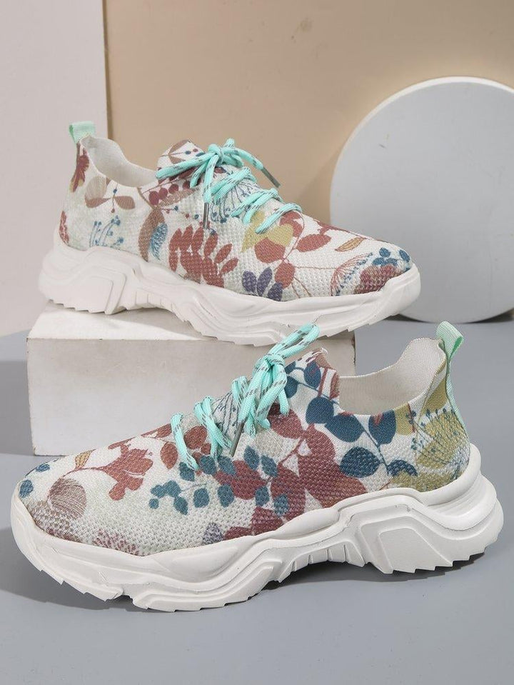 Ademende vetersneakers met bloemenprint