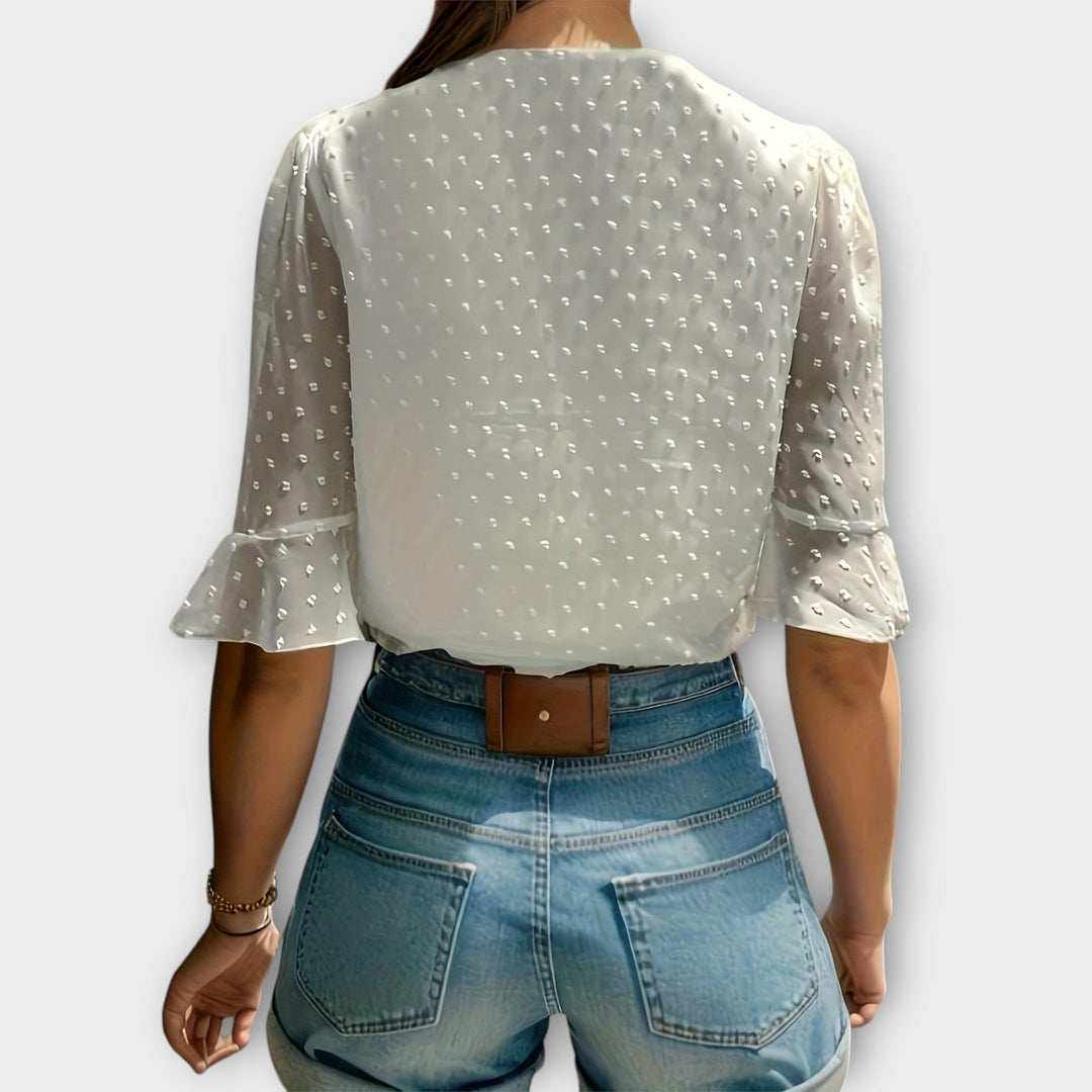 Blouse met diepe halslijn – Soft-Touch statement piece voor elegante avonden of weekendstyling