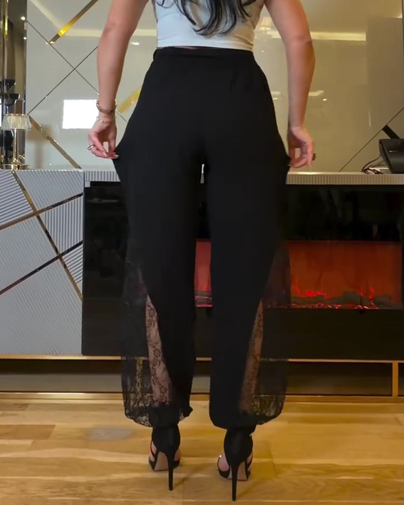 Broek met elastische taille en kanten panelen