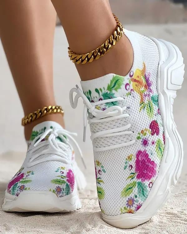 Ademende vetersneakers met bloemenprint