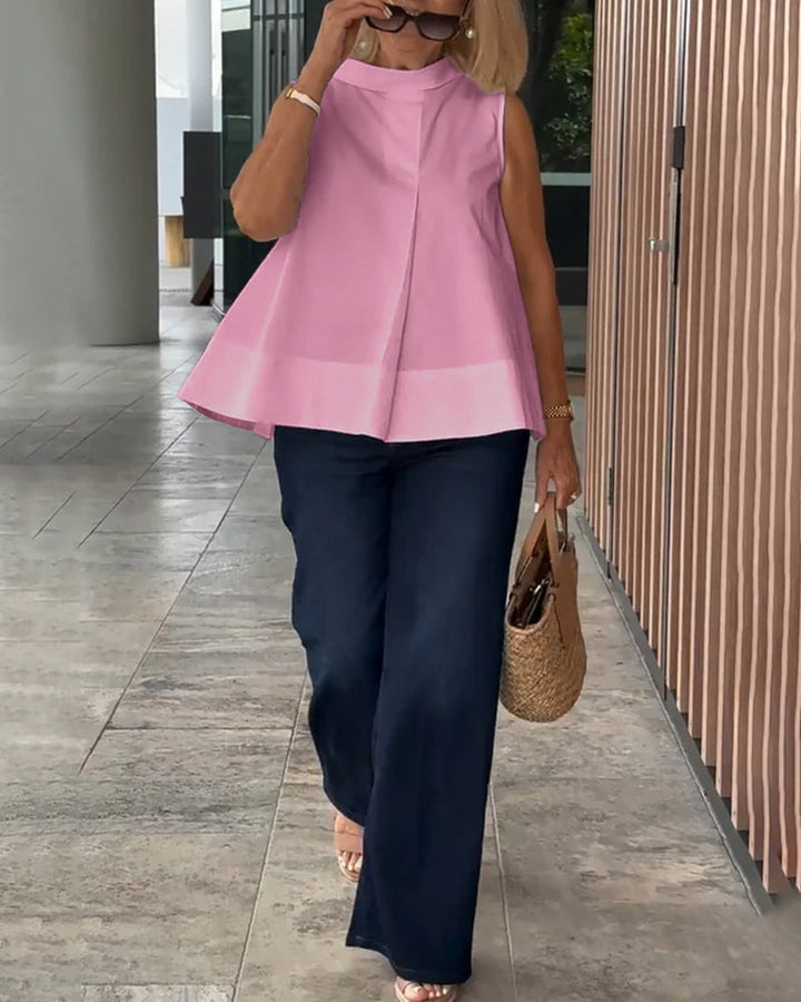 Eenvoudige mouwloze effen blouse