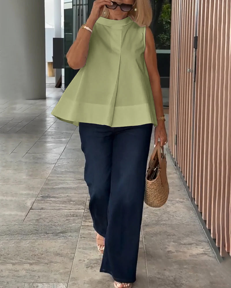 Eenvoudige mouwloze effen blouse