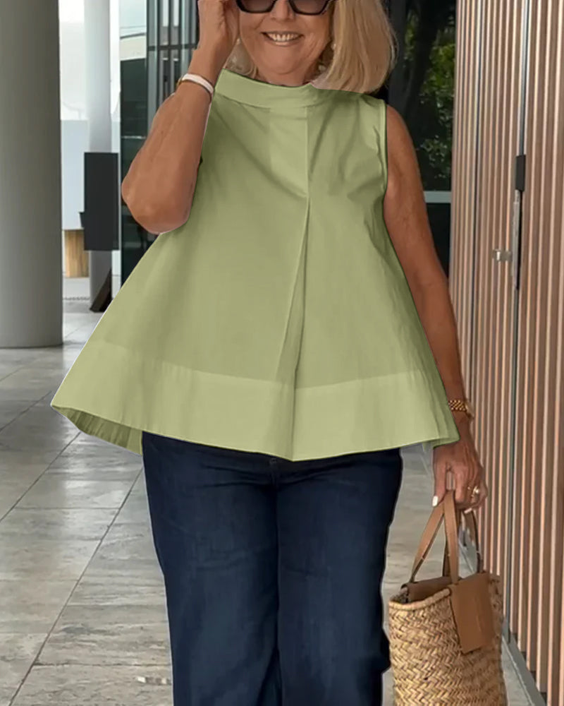 Eenvoudige mouwloze effen blouse