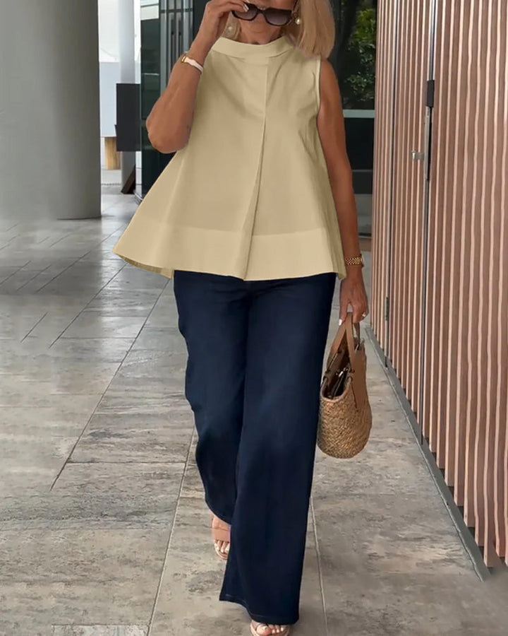 Eenvoudige mouwloze effen blouse