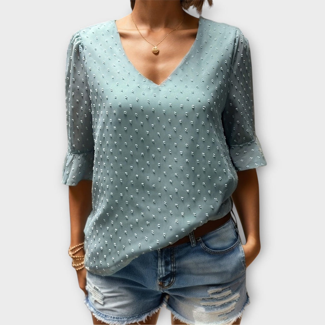 Blouse met diepe halslijn – Soft-Touch statement piece voor elegante avonden of weekendstyling