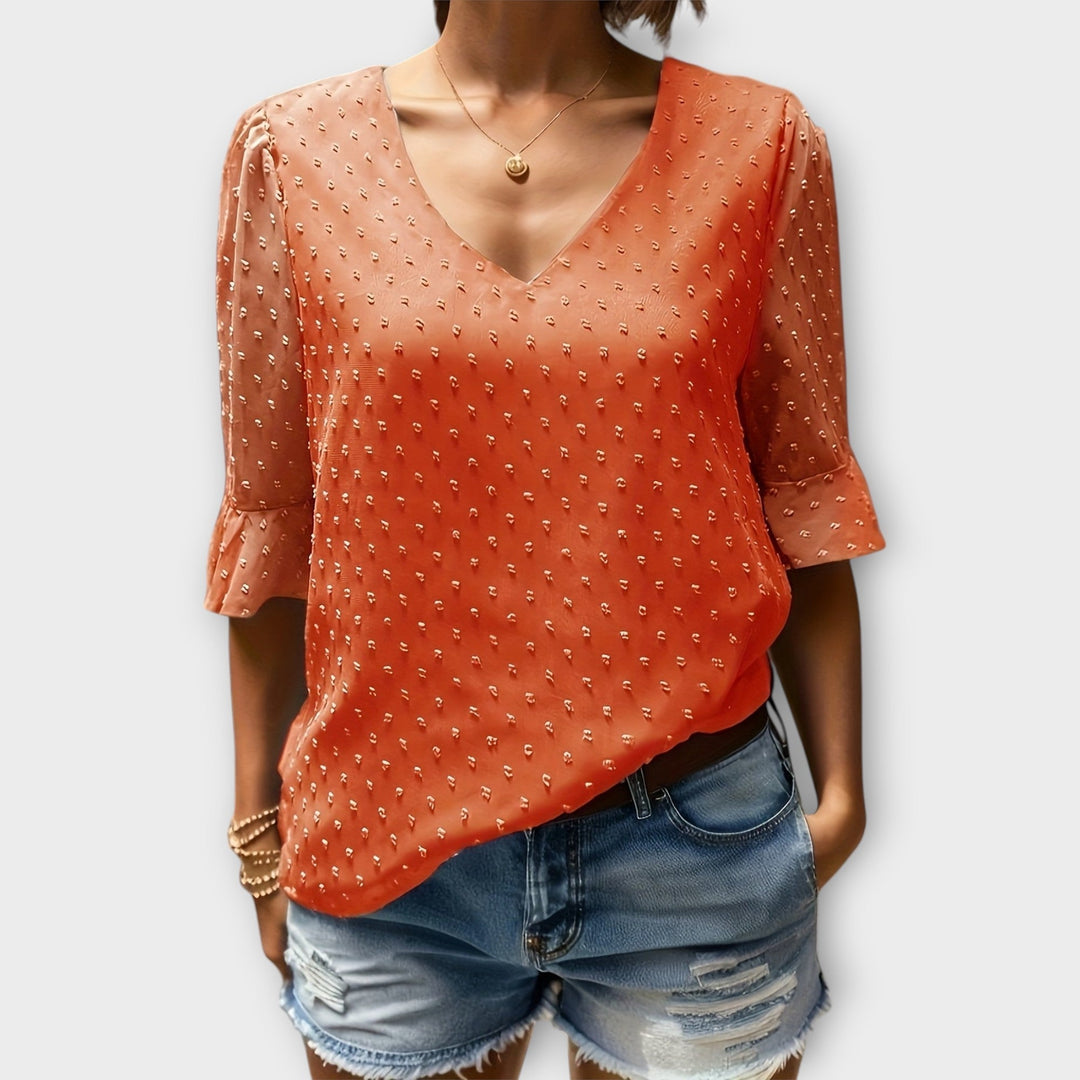 Blouse met diepe halslijn – Soft-Touch statement piece voor elegante avonden of weekendstyling