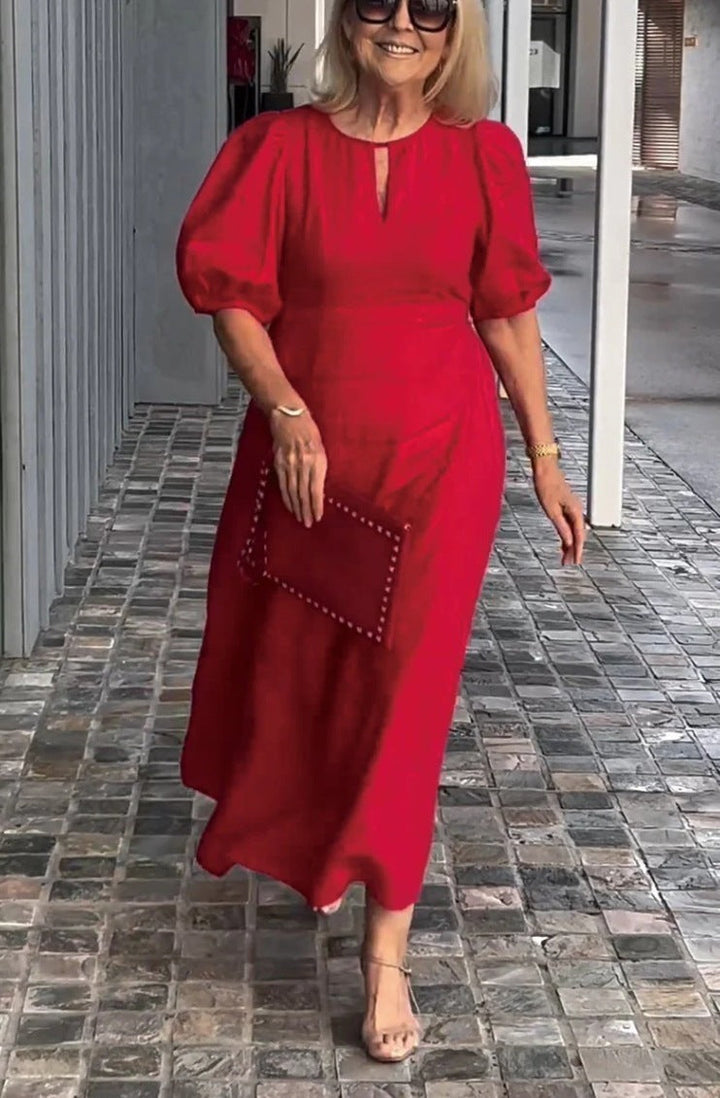 Elegante jurk met opvallende pofmouwen