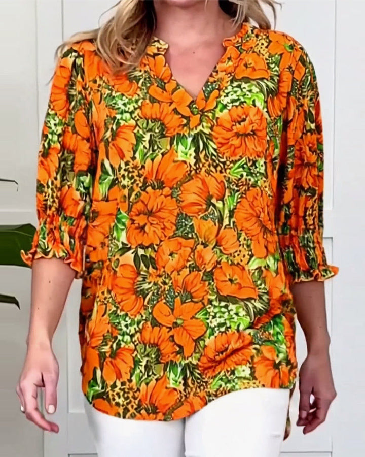 Modieuze bloemenblouse met halve mouwen