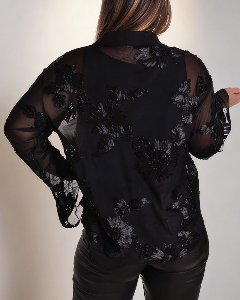 Blouse met kraag en lange klokmouwen