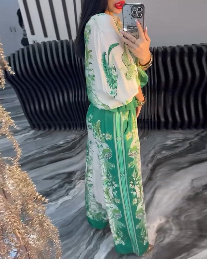 Elegant pak met opstaande kraag, rits en wijde pijpen
