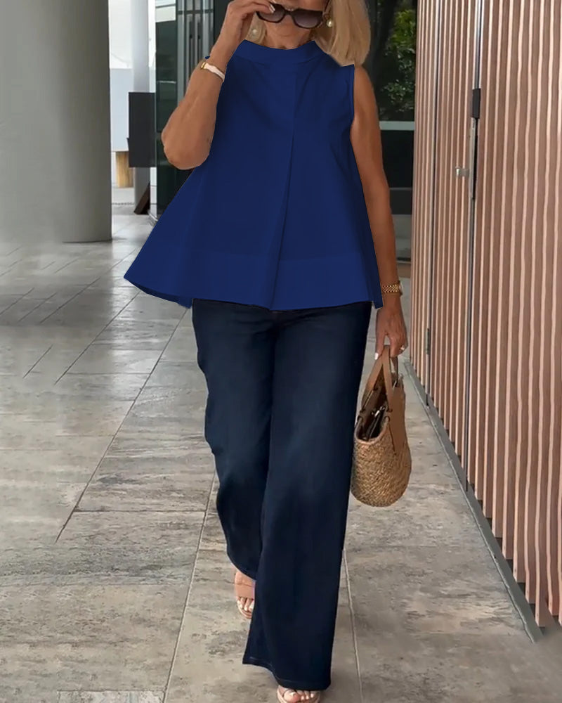 Eenvoudige mouwloze effen blouse