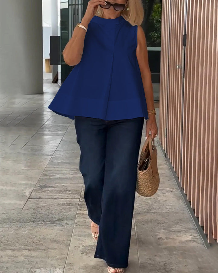 Eenvoudige mouwloze effen blouse
