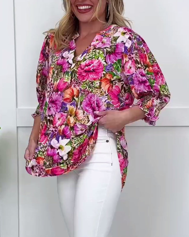 Modieuze bloemenblouse met halve mouwen