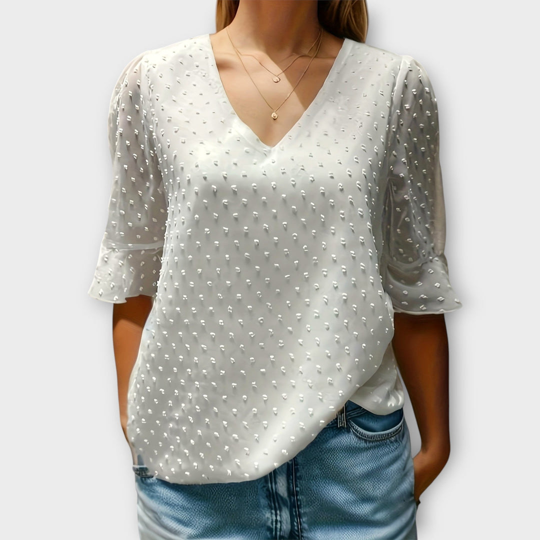 Blouse met diepe halslijn – Soft-Touch statement piece voor elegante avonden of weekendstyling