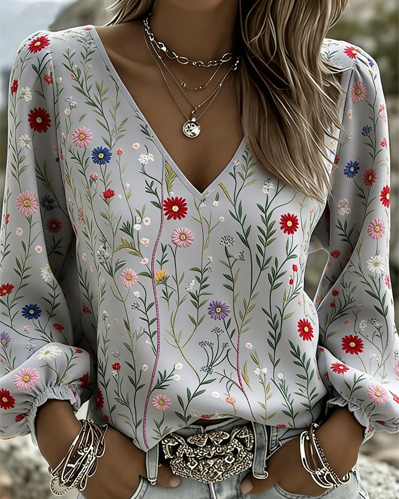 V-hals blouse met bloemenprint en pofmouwen