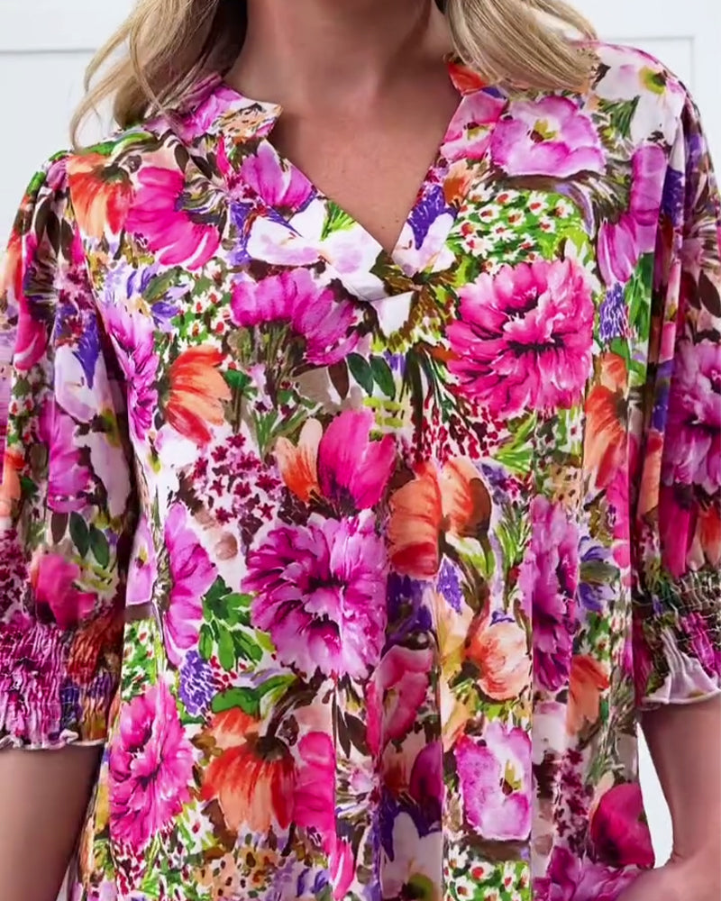 Modieuze bloemenblouse met halve mouwen