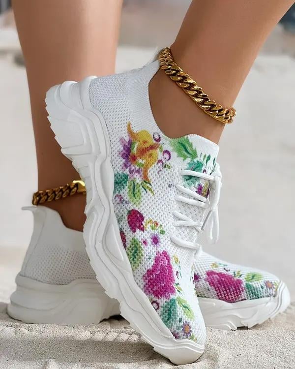 Ademende vetersneakers met bloemenprint