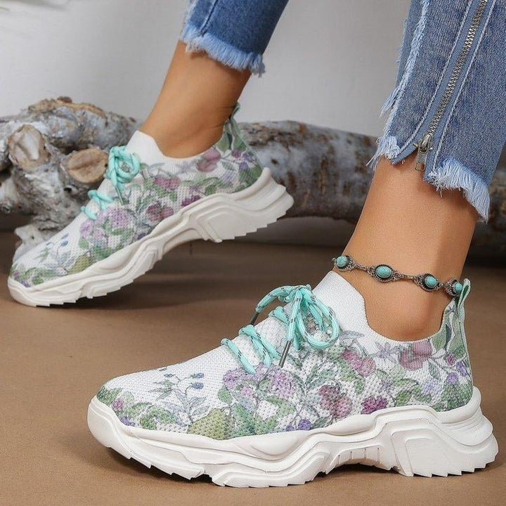 Ademende vetersneakers met bloemenprint
