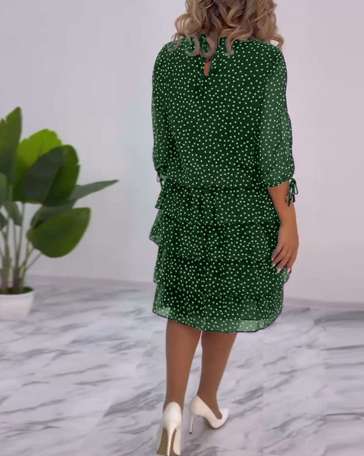 elegante gelaagde jurk met polkadotprint