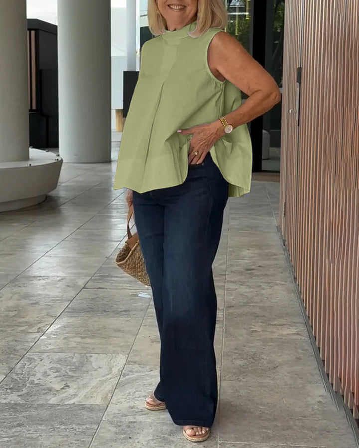 Eenvoudige mouwloze effen blouse