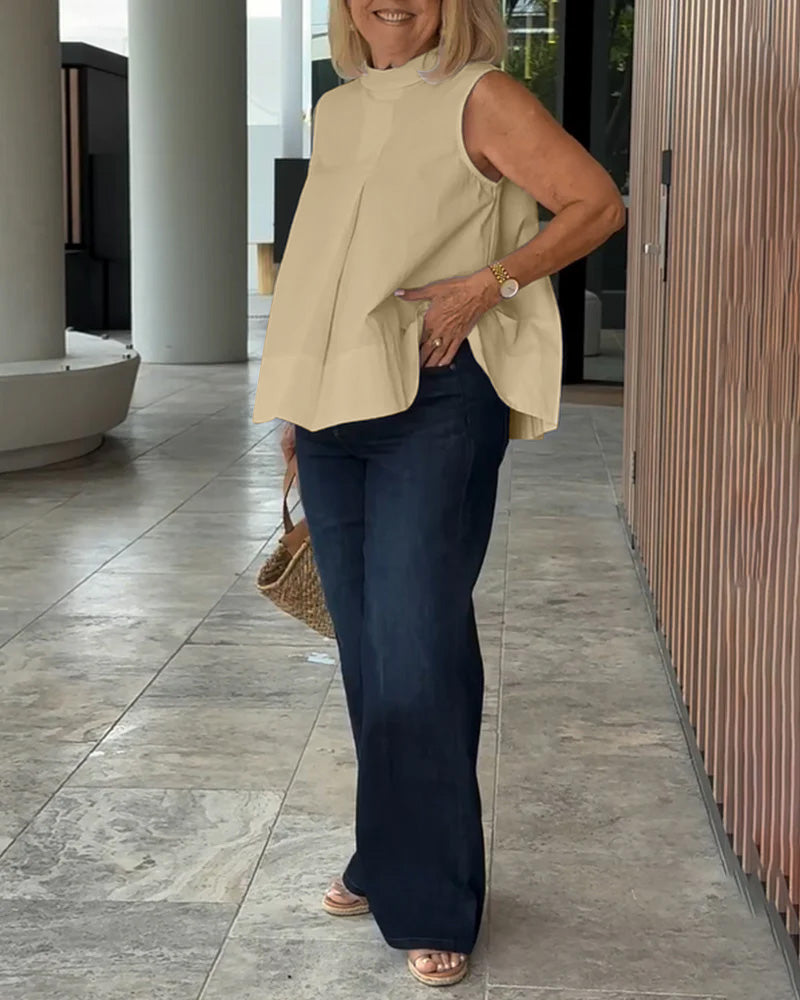 Eenvoudige mouwloze effen blouse