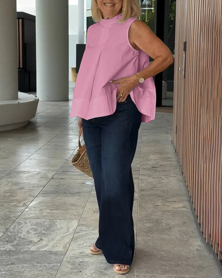 Eenvoudige mouwloze effen blouse