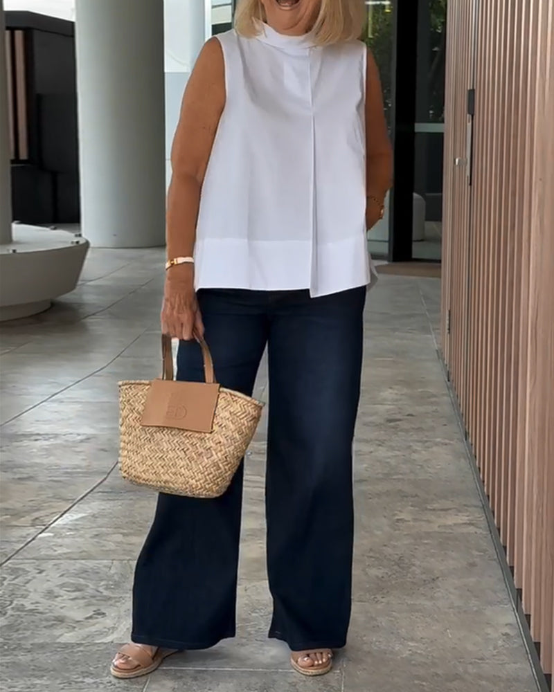 Eenvoudige mouwloze effen blouse