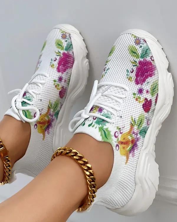 Ademende vetersneakers met bloemenprint