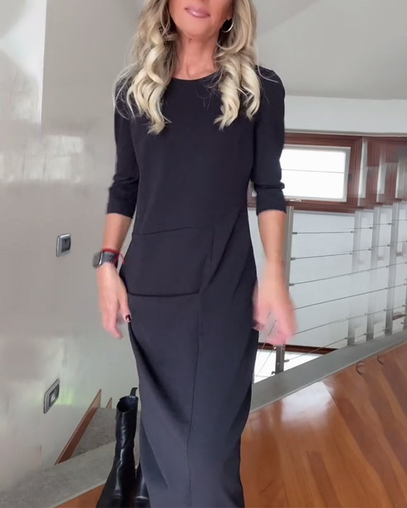 Elegante effen jurk met ronde hals en plooien