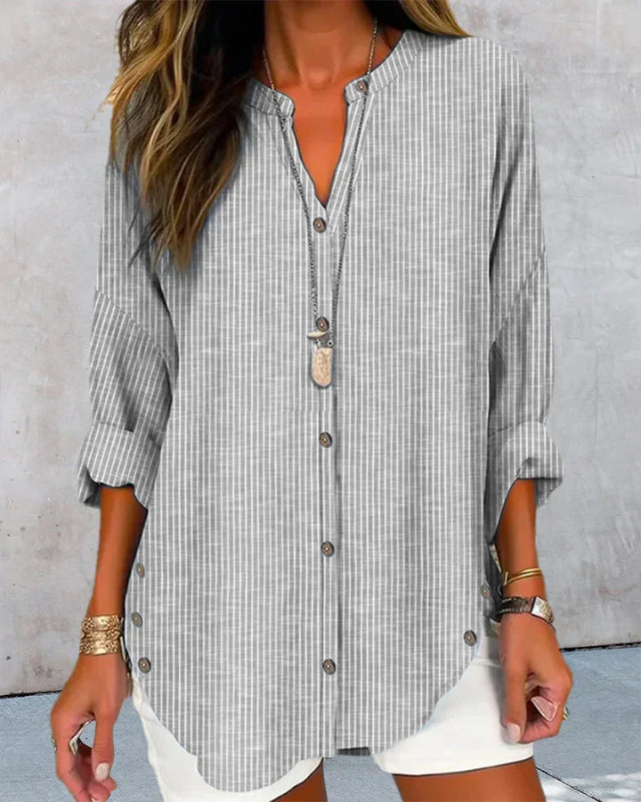 Elegante V-hals top met tijdloos streeppatroon