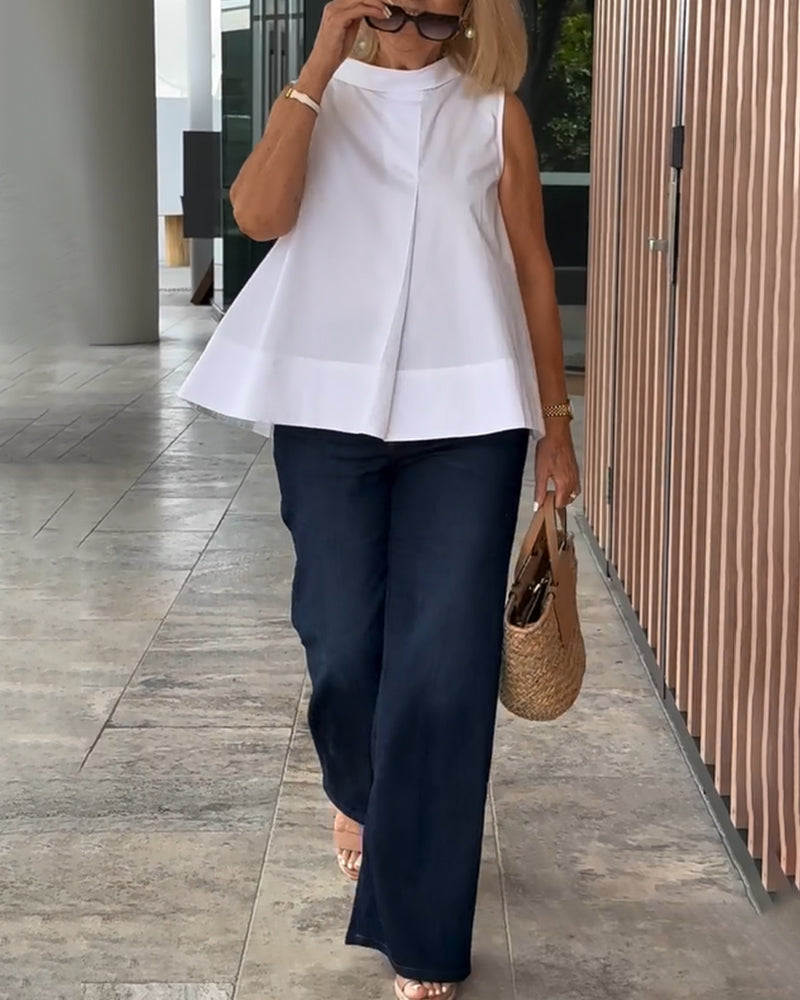 Eenvoudige mouwloze effen blouse