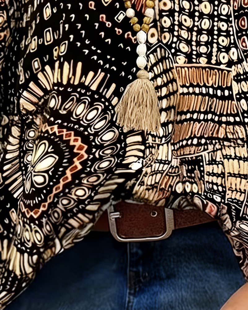 Bedrukte V-hals blouse met vleermuismouwen