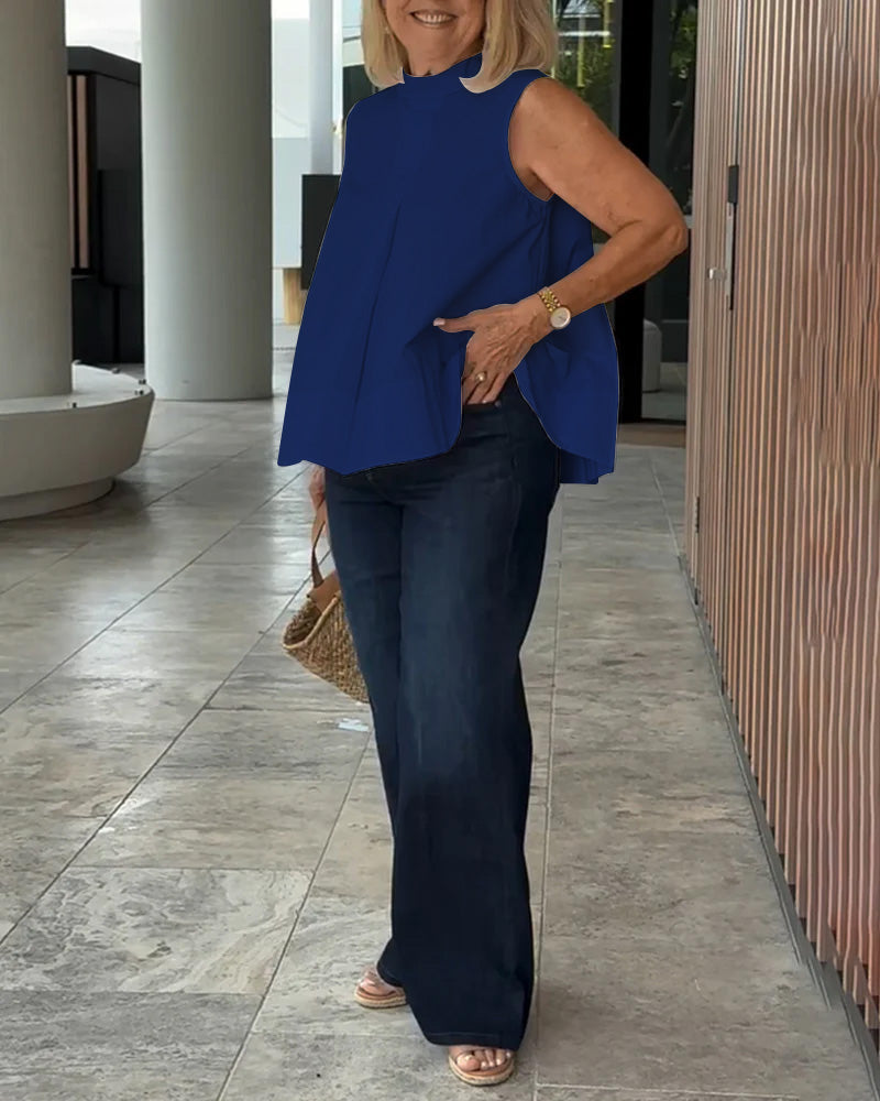 Eenvoudige mouwloze effen blouse