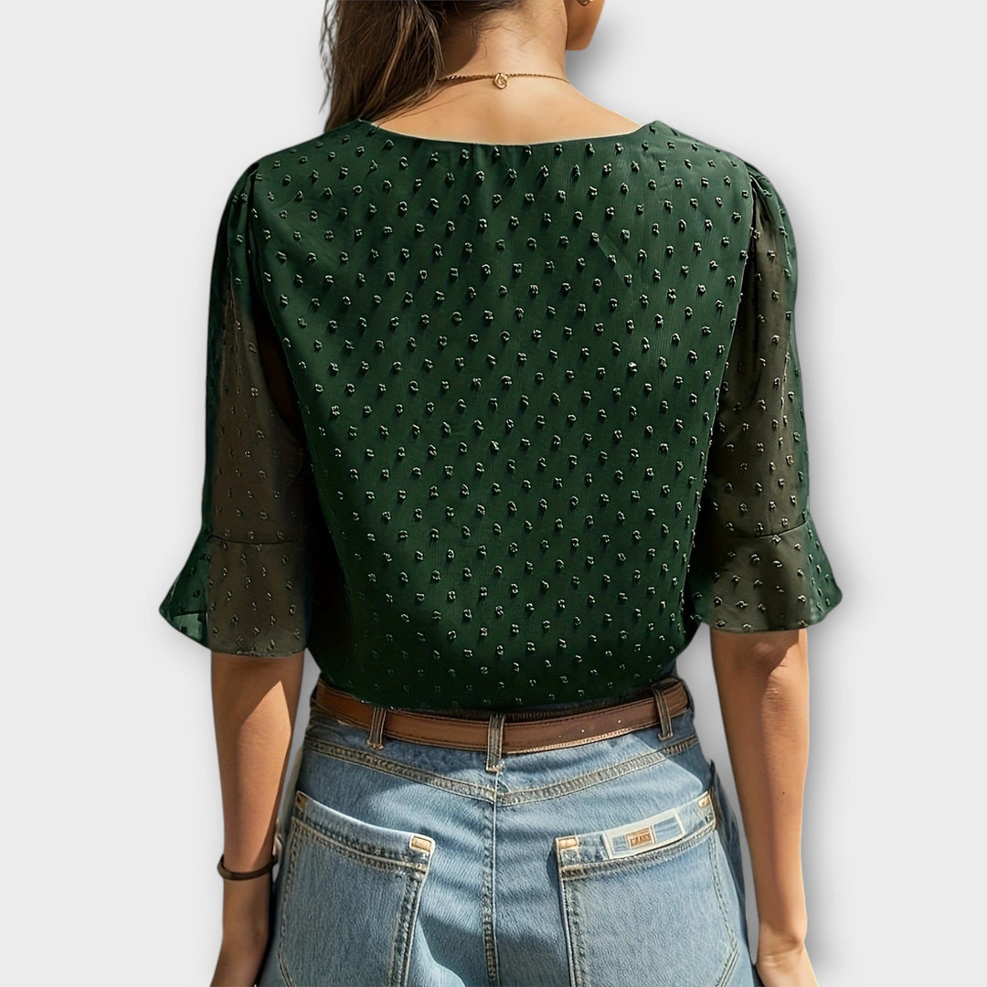 Blouse met diepe halslijn – Soft-Touch statement piece voor elegante avonden of weekendstyling