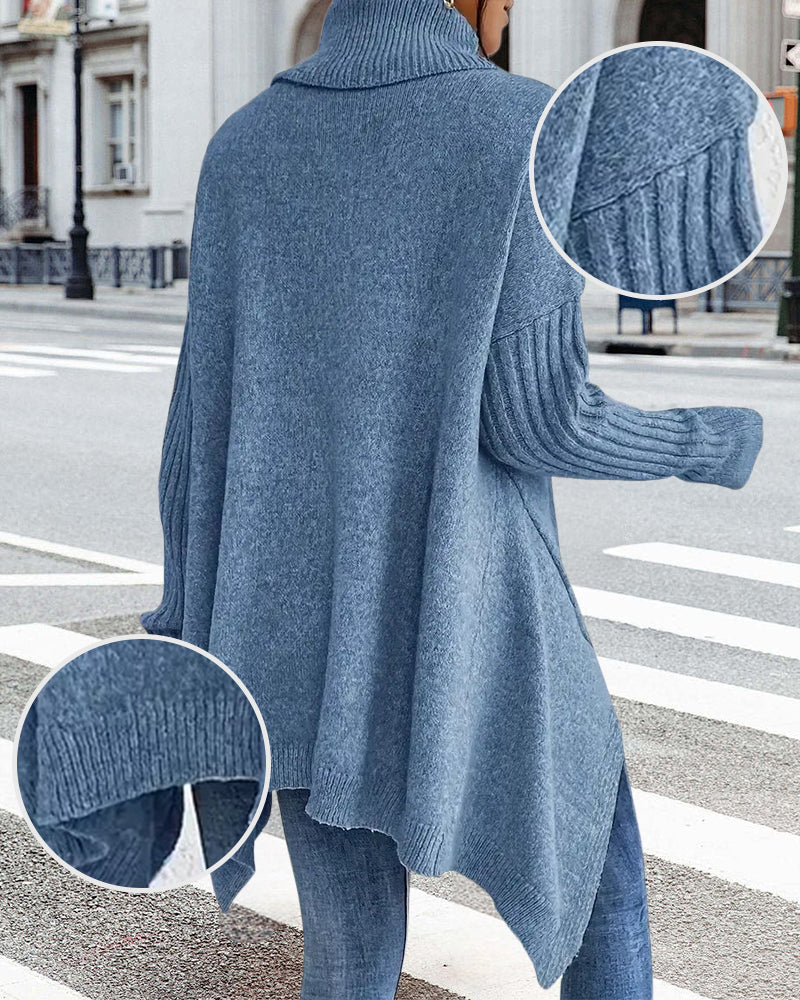 Losse sweater met hoge kraag en asymmetrisch ontwerp