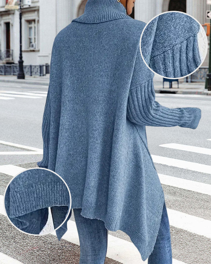 Losse sweater met hoge kraag en asymmetrisch ontwerp