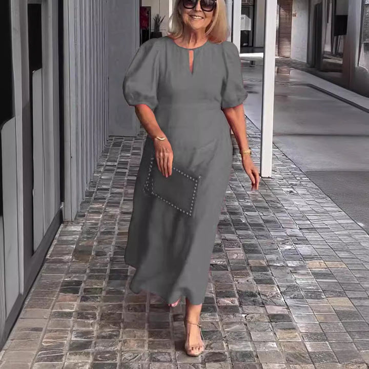 Elegante jurk met opvallende pofmouwen