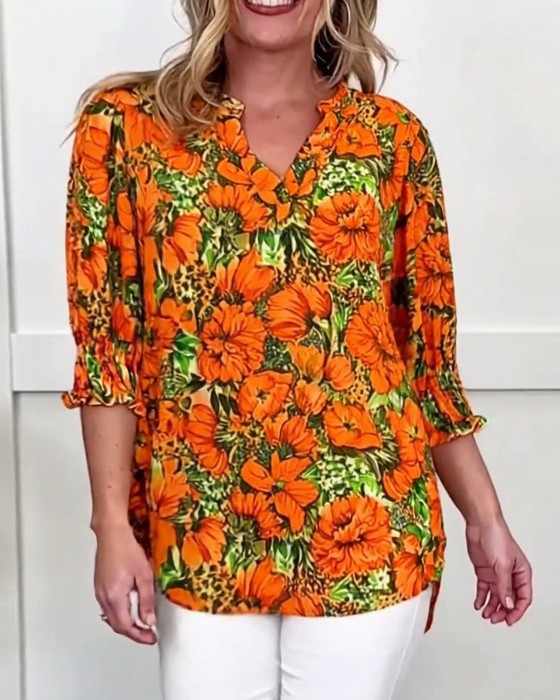 Modieuze bloemenblouse met halve mouwen