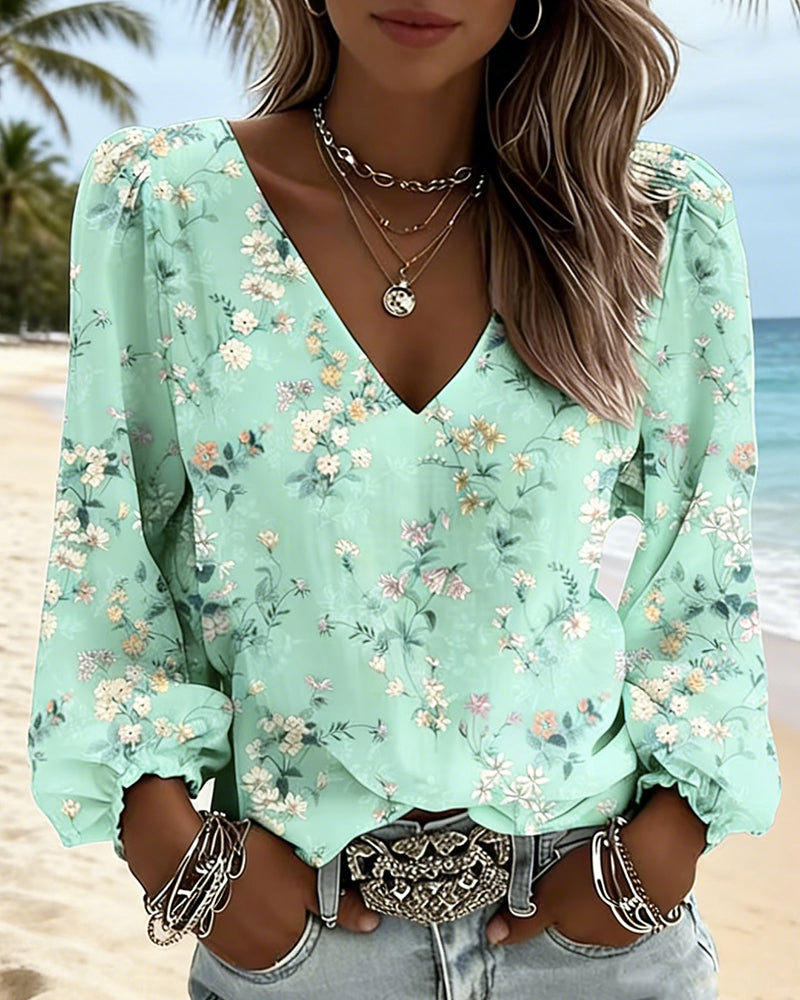 Bloemenblouse met V-hals en pofmouwen