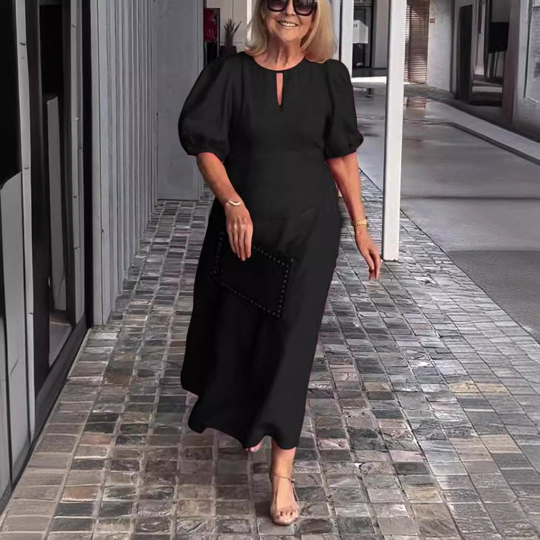 Elegante jurk met opvallende pofmouwen