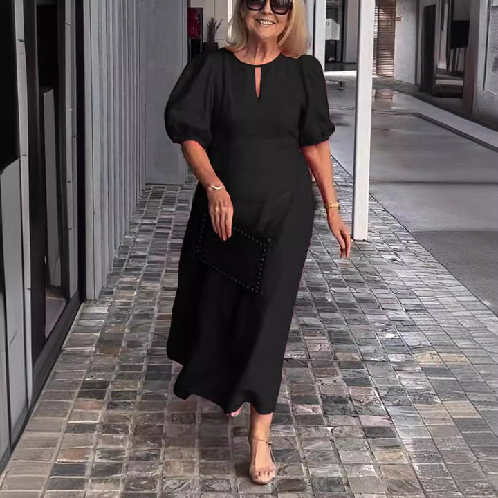 Elegante jurk met opvallende pofmouwen