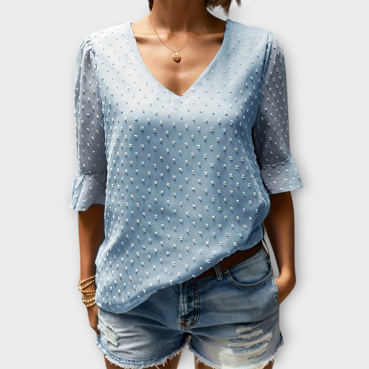Blouse met diepe halslijn – Soft-Touch statement piece voor elegante avonden of weekendstyling
