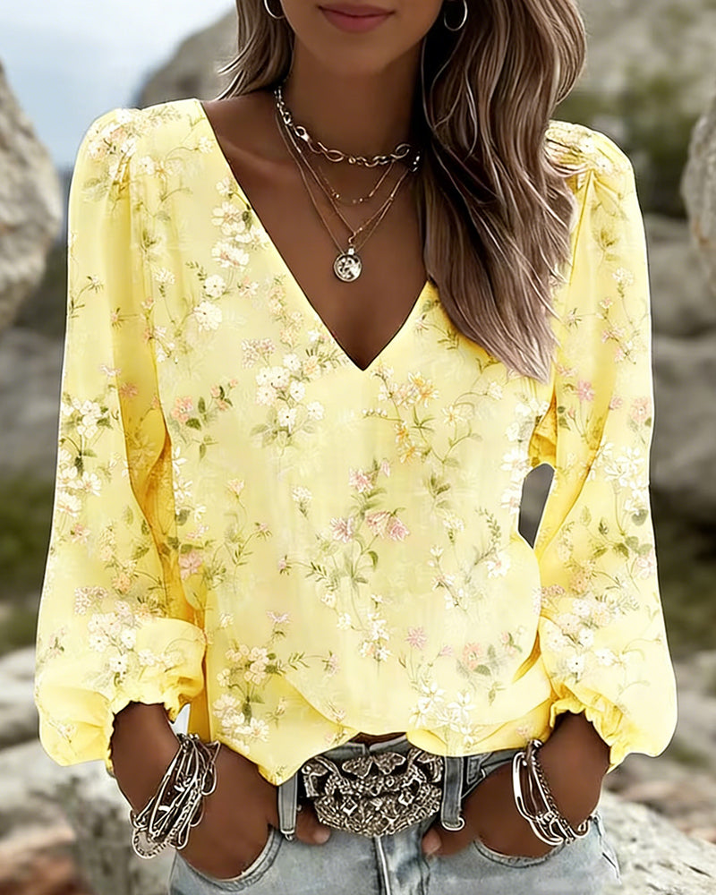 Bloemenblouse met V-hals en pofmouwen