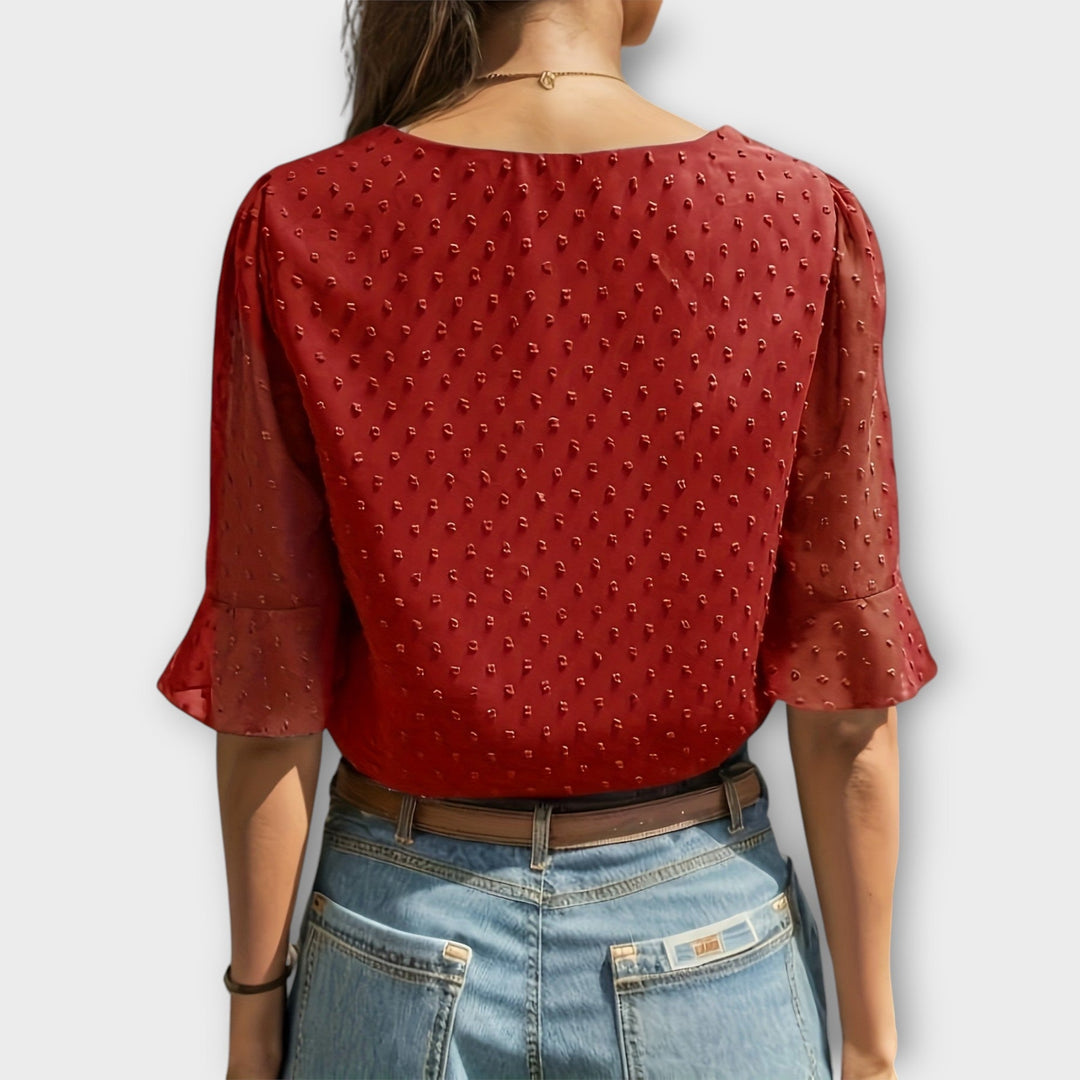 Blouse met diepe halslijn – Soft-Touch statement piece voor elegante avonden of weekendstyling