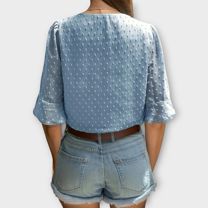 Blouse met diepe halslijn – Soft-Touch statement piece voor elegante avonden of weekendstyling