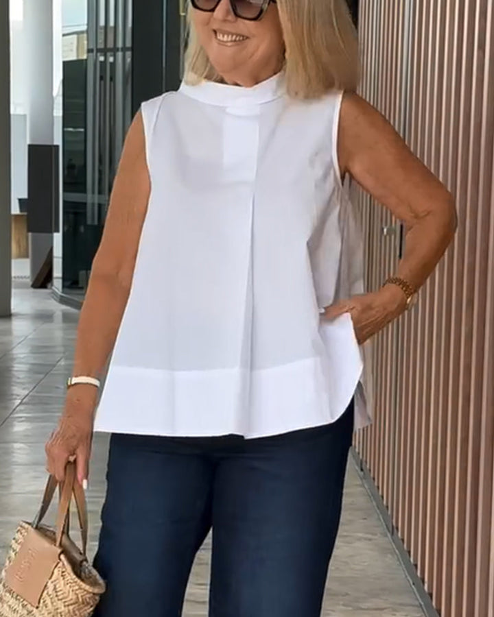 Eenvoudige mouwloze effen blouse