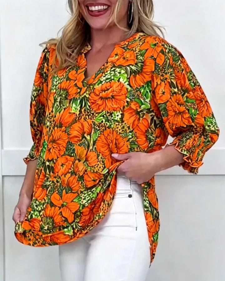 Modieuze bloemenblouse met halve mouwen