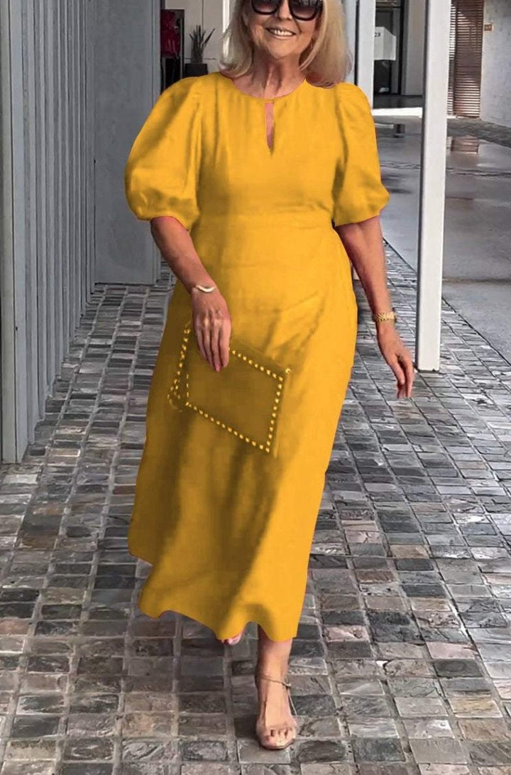 Elegante jurk met opvallende pofmouwen